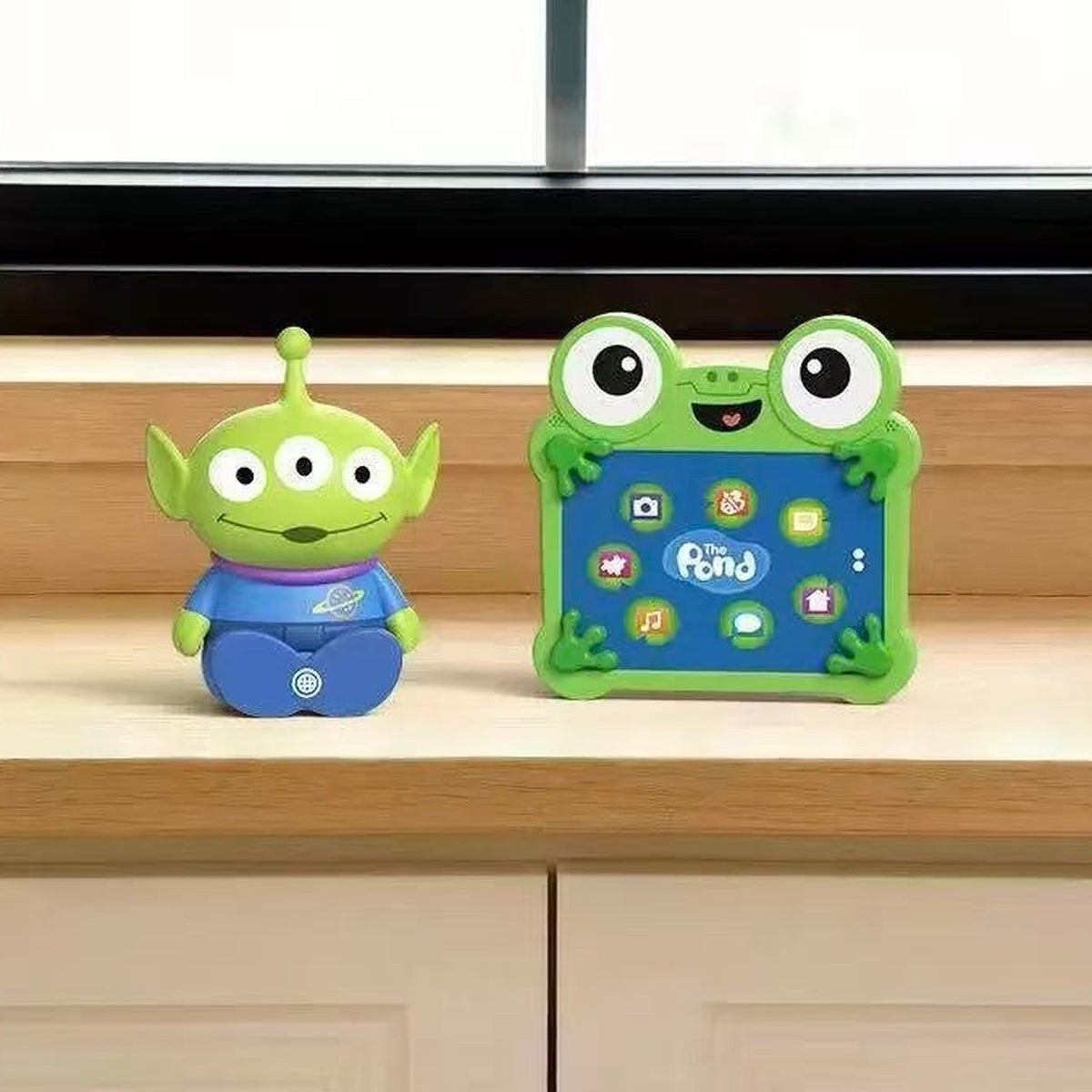 DSN Pixar Toy Story Cosmic Cuteness Series Mini Figure Blind Box - Complete alien mini figure example beside themed display object; random design not guaranteed