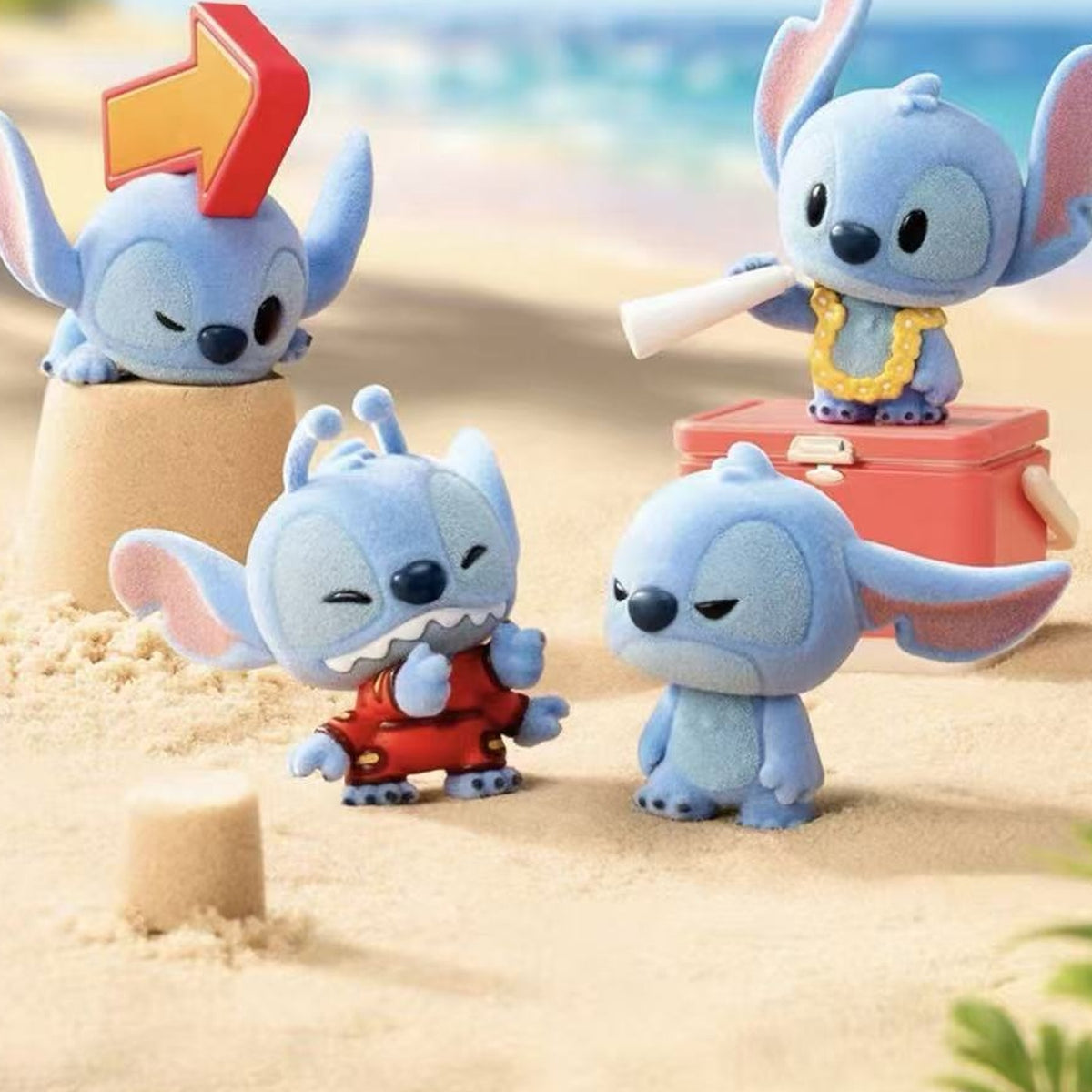 DSN Stitch Minime Series Figure Blind Box - Stitch Minime beach display with complete central figure examples; random design not guaranteed