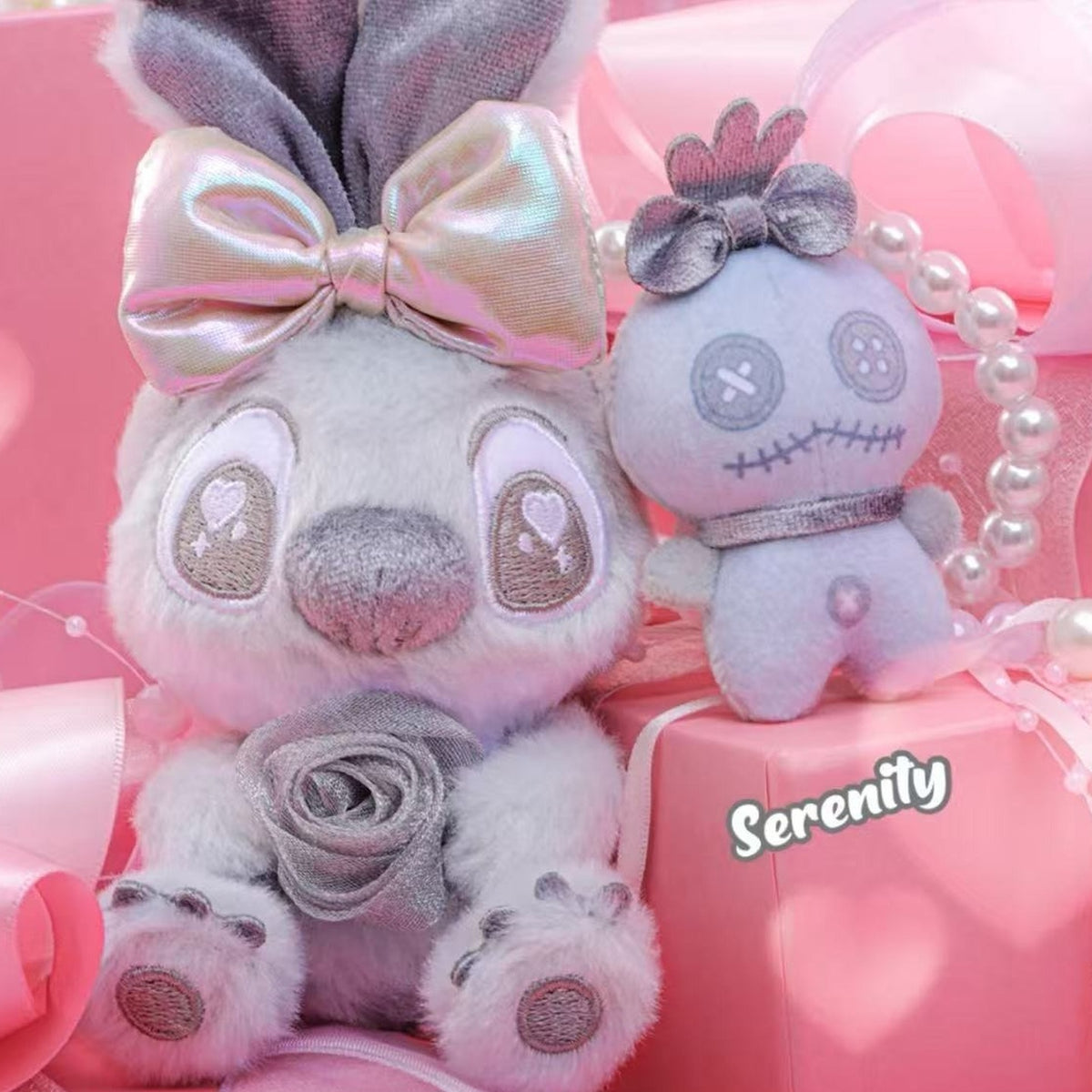 DSN STITCH Lovey Rosey Series Cosbi Plush Keychain Blind Box - Gray STITCH design with smaller character and matching bow; upper ears cropped; random design not guaranteed; display props not included