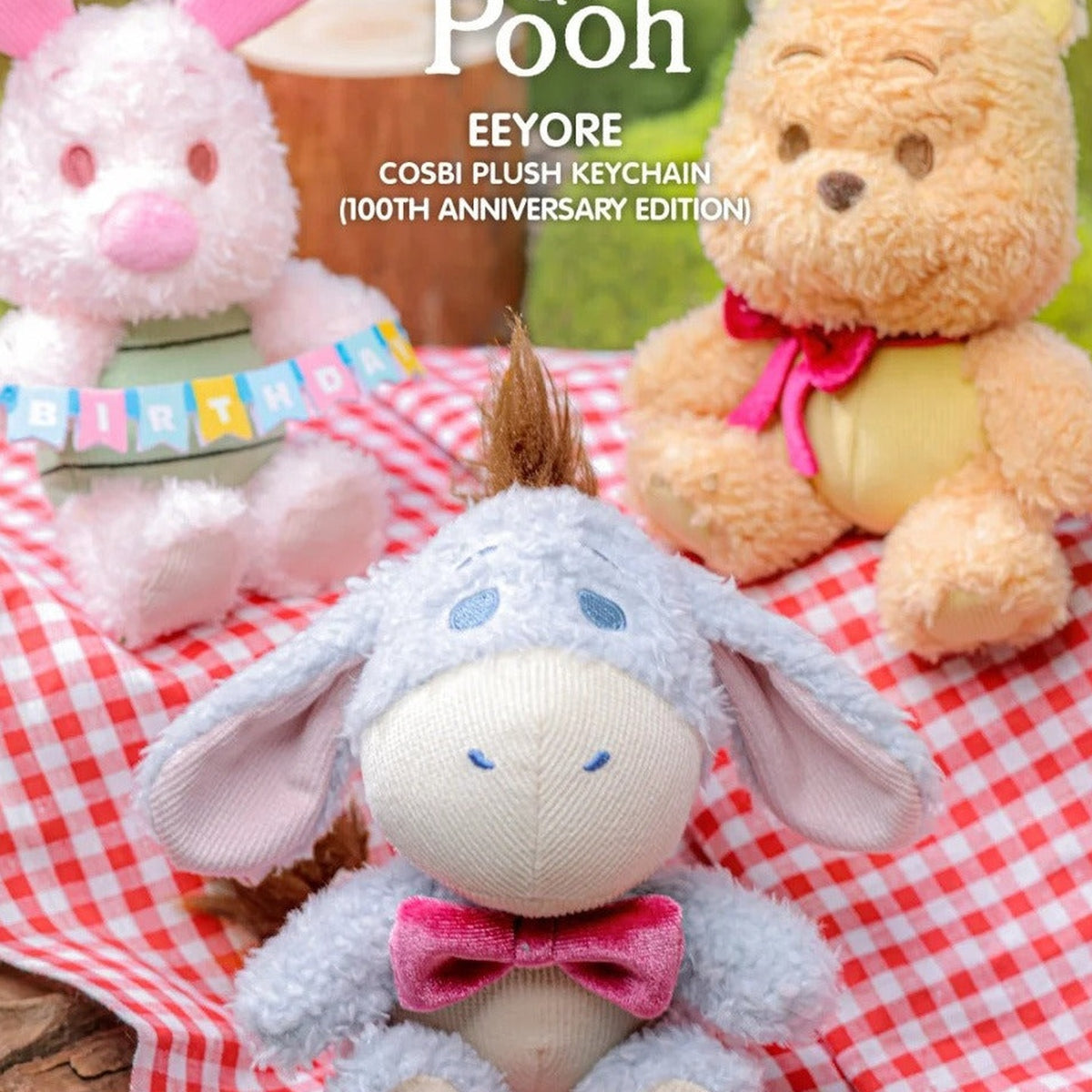 DSN Winnie the Pooh 100th Anniversary Edition Series Plush Pendant Blind Box - Eeyore anniversary plush pendant detail with lower body cropped; random design not guaranteed