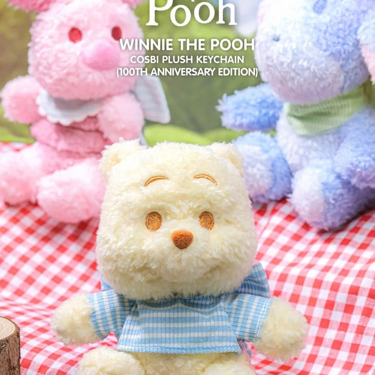 DSN Winnie the Pooh 100th Anniversary Edition Series Plush Pendant Blind Box - Winnie the Pooh anniversary plush pendant detail with lower feet cropped; random design not guaranteed