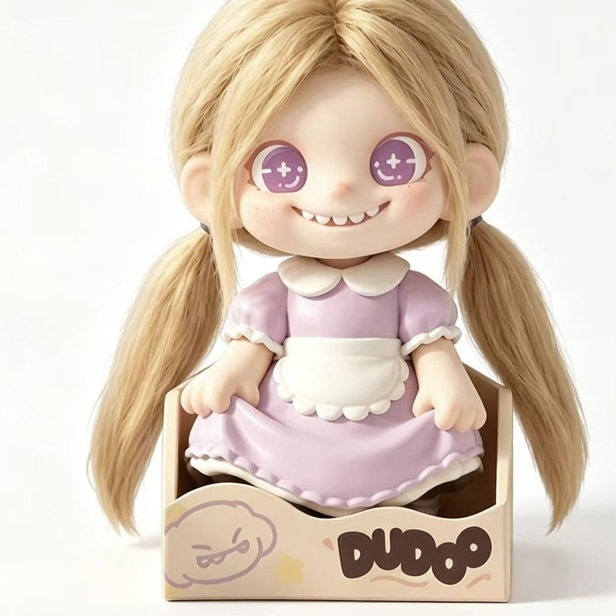 DUDOO Memory Store design example in a lavender outfit seated in a box; random design is not selectable