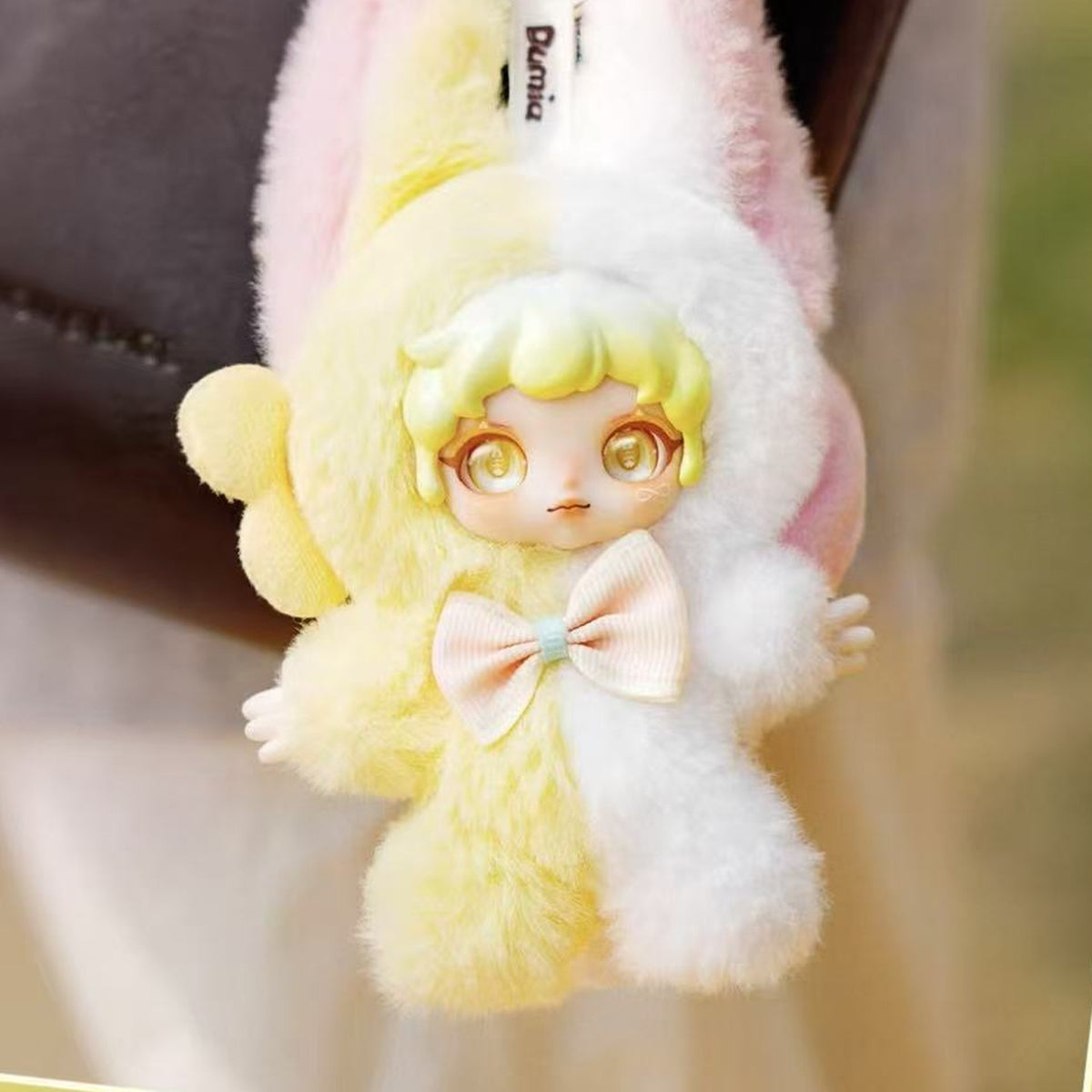Dumia The Lost Land Series Plush Pendant Blind Box - Yellow plush pendant detail with upper ears cropped; random design not guaranteed