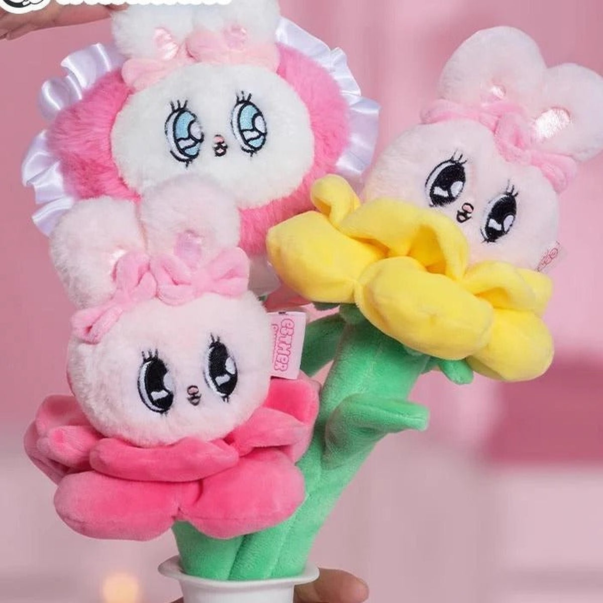 Esther Bunny Flower Series Plush Dolls, Blind Box - Pink and yellow flower plush examples with lower stems partially obscured; random design not guaranteed
