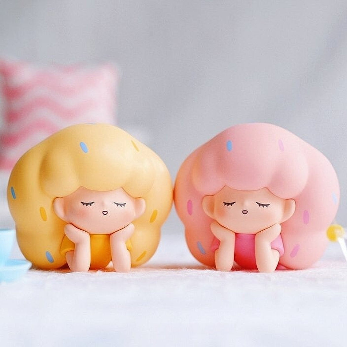 Fluffy Lili It's Also Very Happy to Be Alone Series Figures Blind Box - Complete yellow and pink Lili figure examples in resting pose; random design not guaranteed