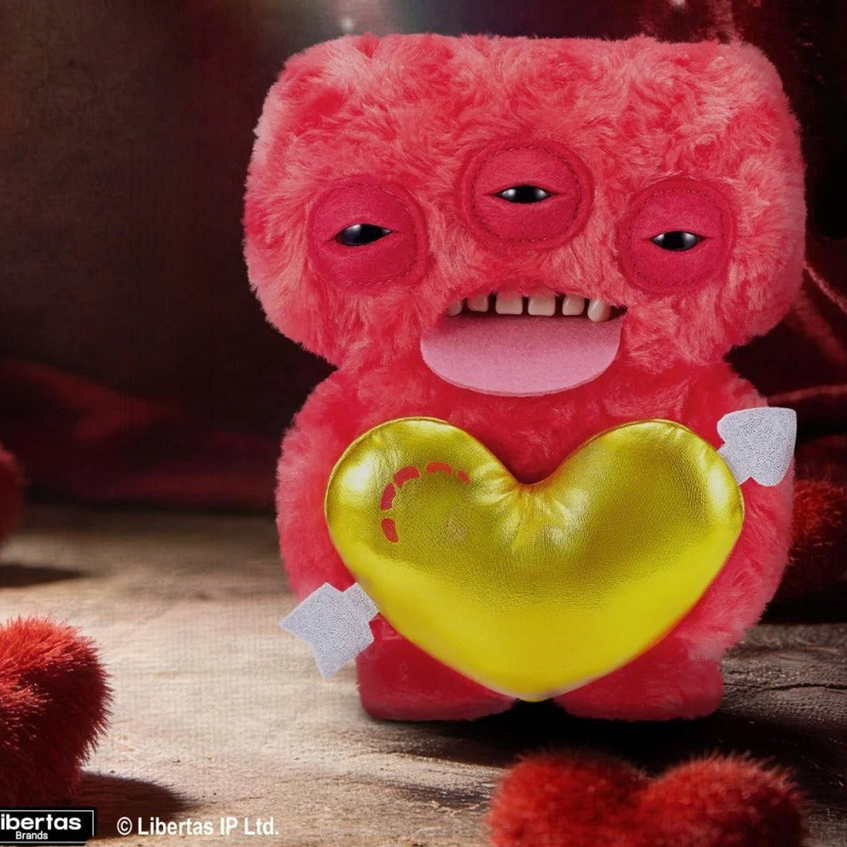 FUGG LOVE Annoyed Alien — red plush and heart detail