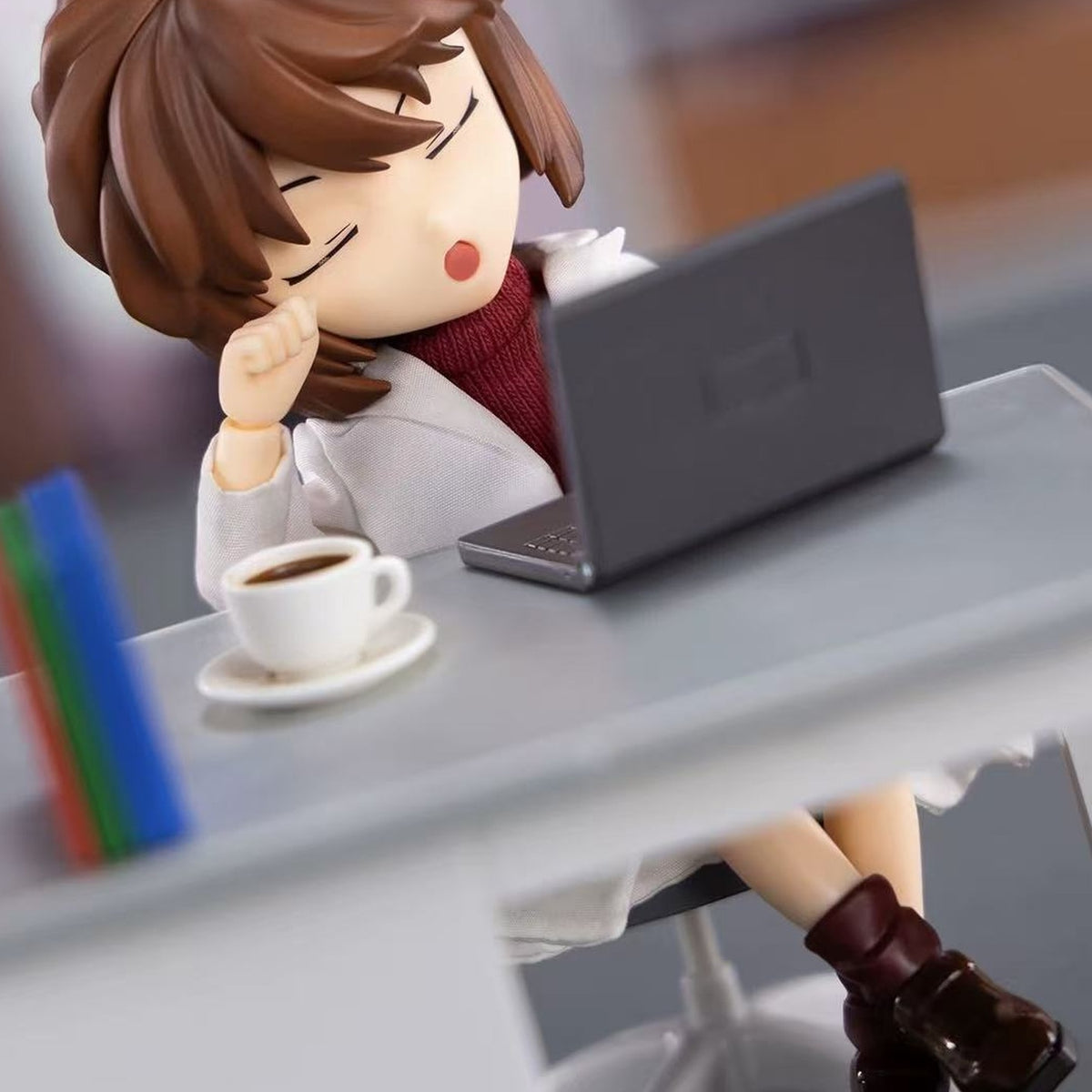Haibara Ai action figure — seated at a desk in a styled scene