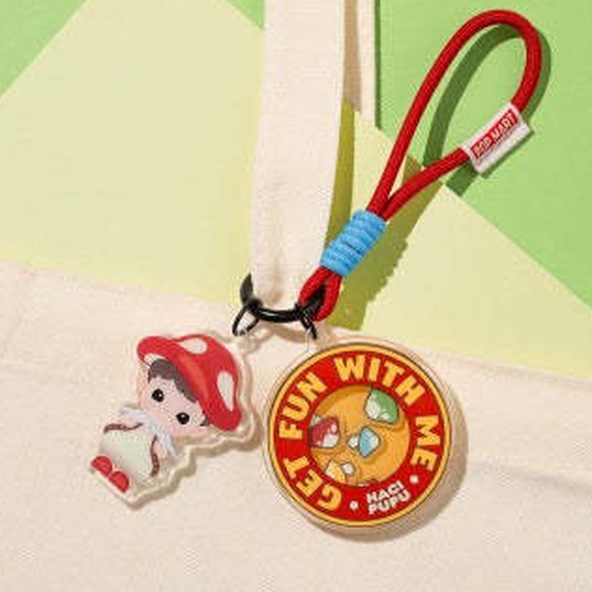 HACIPUPU Adventures In The Woods Mushroom pendant hanging from a display bag; bag not included
