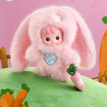 HACIPUPU Enchanted Realm Tales blind box series - design example in a pink rabbit costume holding a carrot