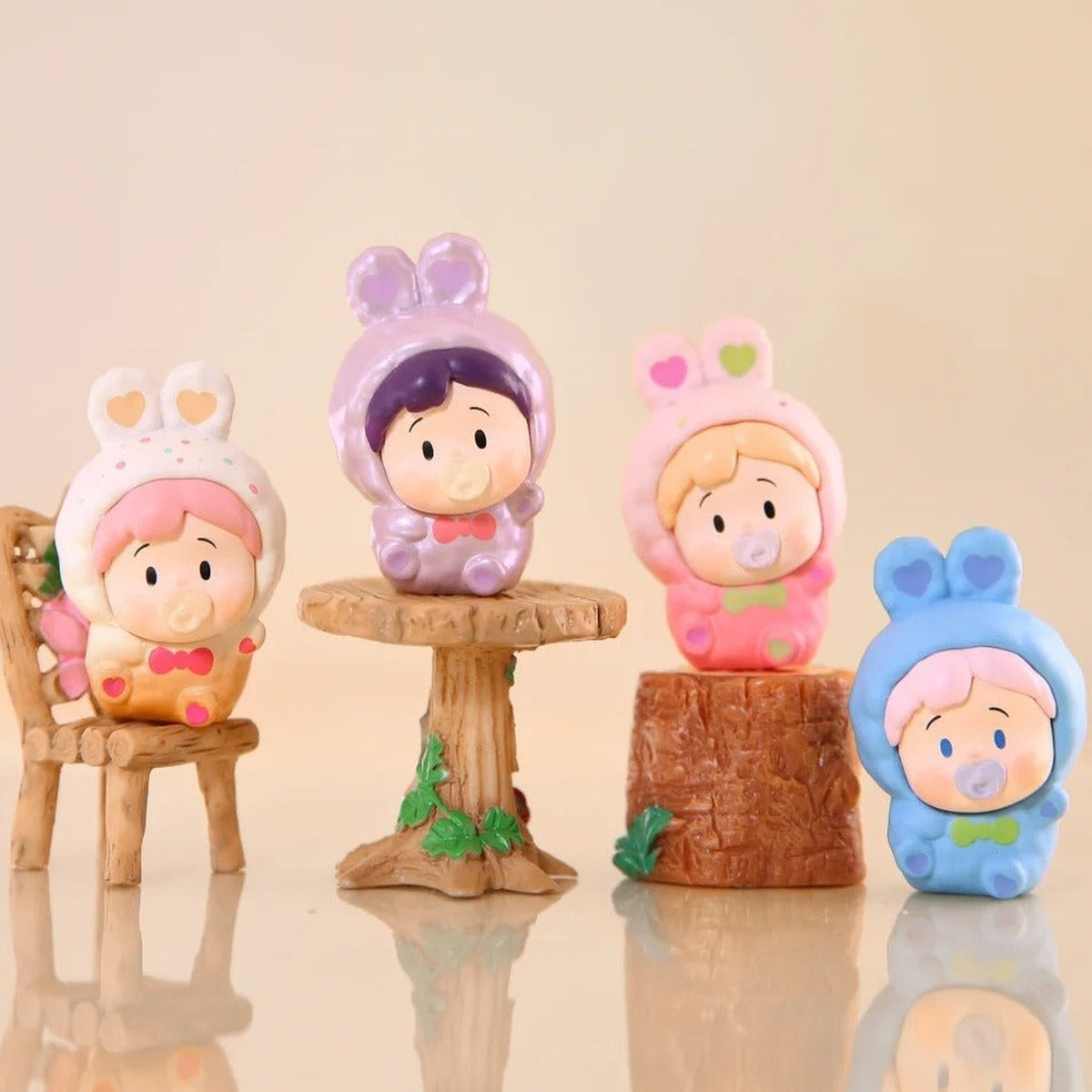 HANAMAKI Rabbit Dot Series Mini Figure Blind Box - Series comparison with complete central mini figures and cropped outer edge; random design not guaranteed