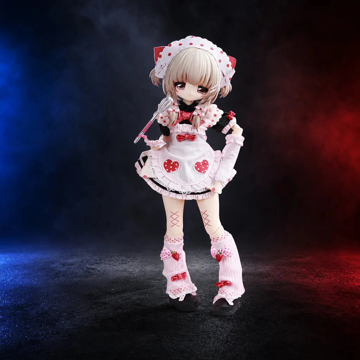 Heart of Darkness articulated doll in pink pastry-themed outfit with heart apron and whisk; random-series design example, not selectable