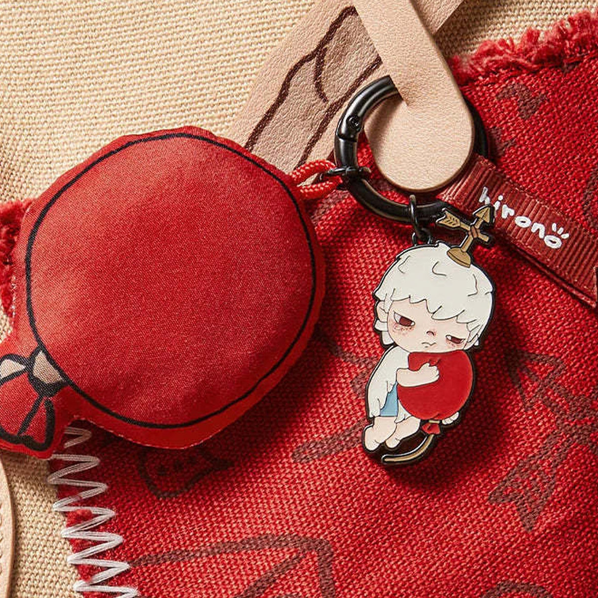 HIRONO Mime pendant series - red ball pendant, metal character charm and clasp detail; design example