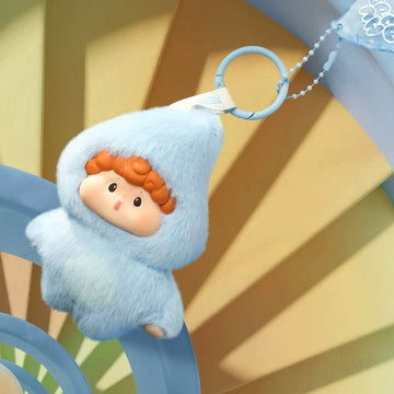 Hudodo Journey of Energy: complete blue-costume design example with orange hair and hanging ring; random design is not guaranteed
