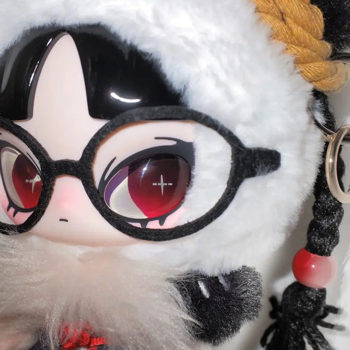 INN Lucky Omen face and tassel closeup; one fixed plush pendant, multiple views are not additional items