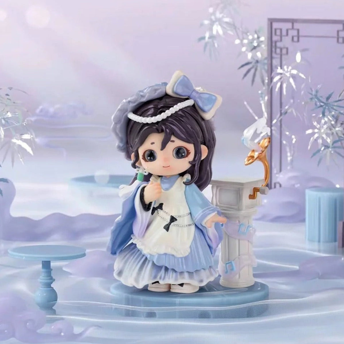 Dark-haired JOY figure in a blue-and-white dress; random-series example | KikiBuddies