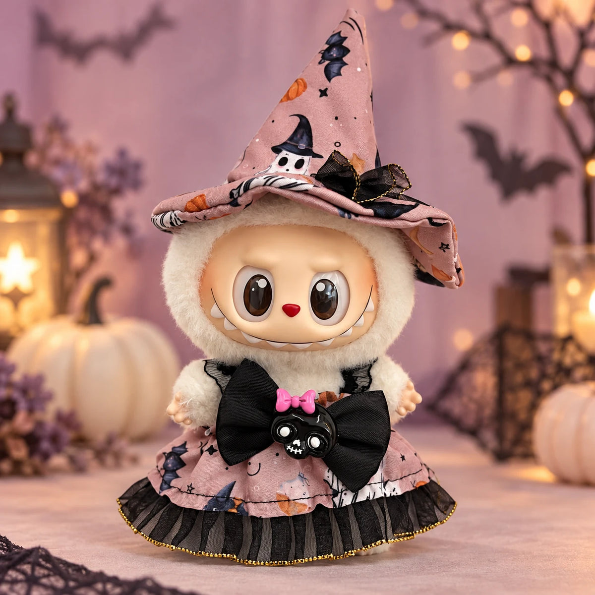 Labubu doll modeling the dusty pink ghost witch Halloween outfit