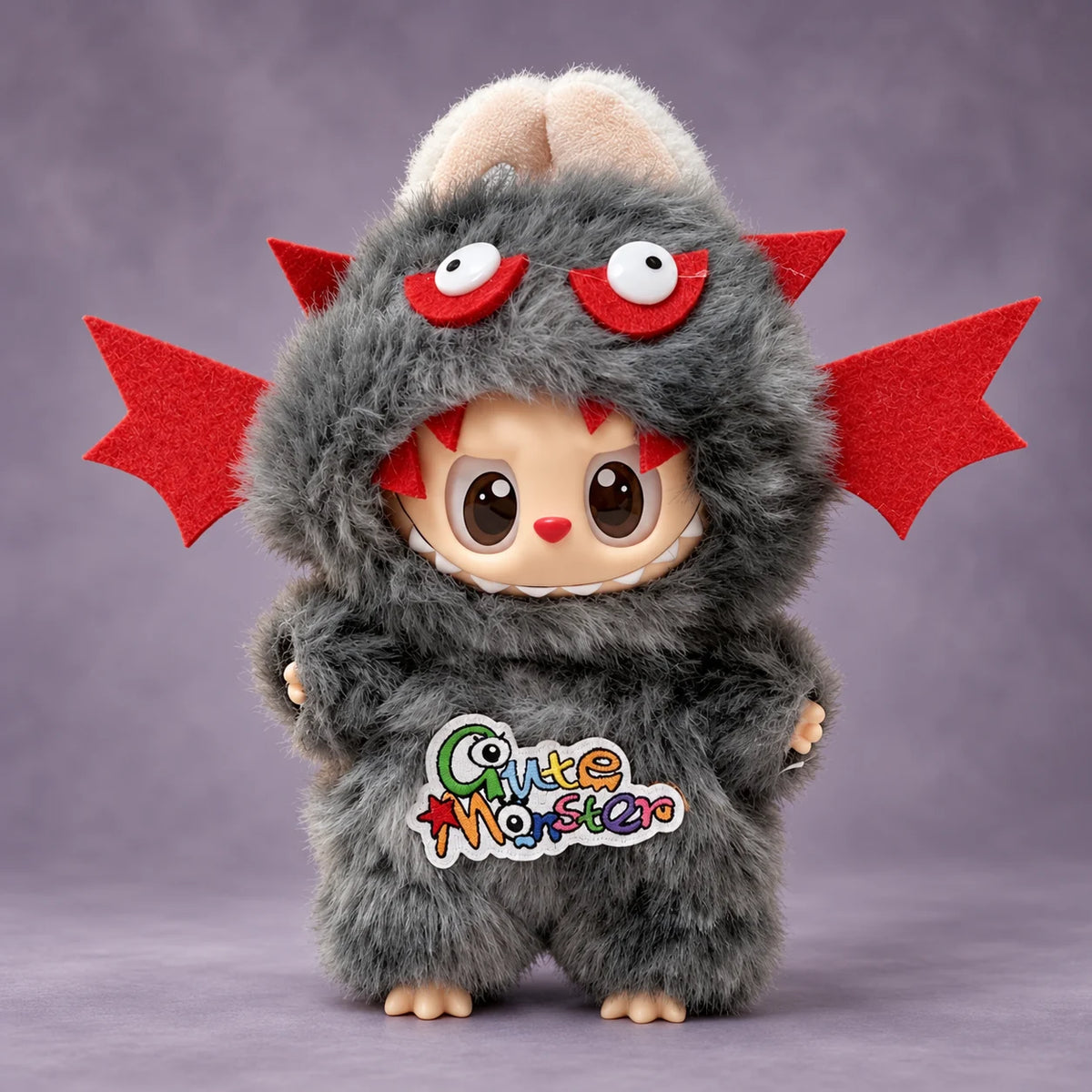 Labubu doll modeling the gray monster Halloween outfit