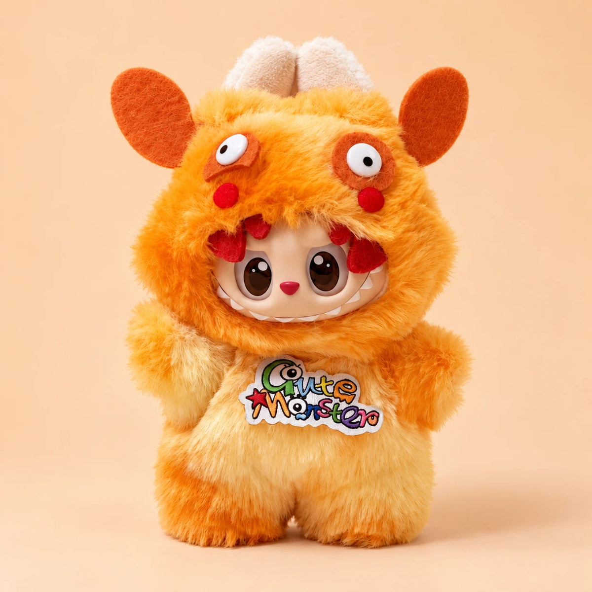 Labubu doll modeling the orange monster Halloween outfit