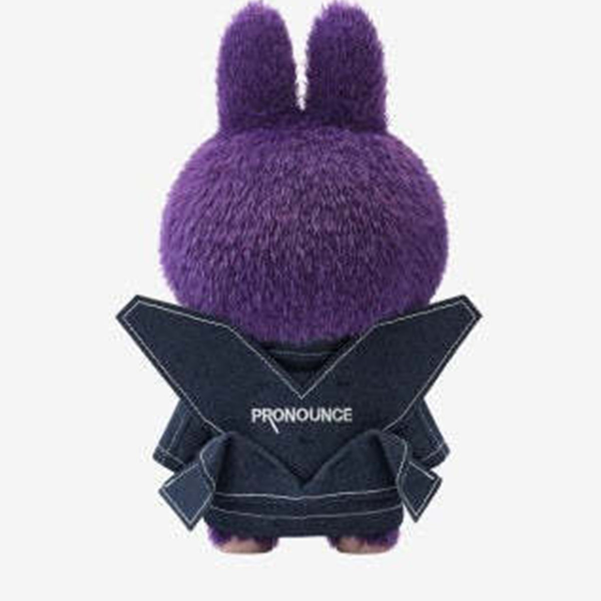 Rear view of LABUBU Wings of Fantasy doll showing the PRONOUNCE coat design
