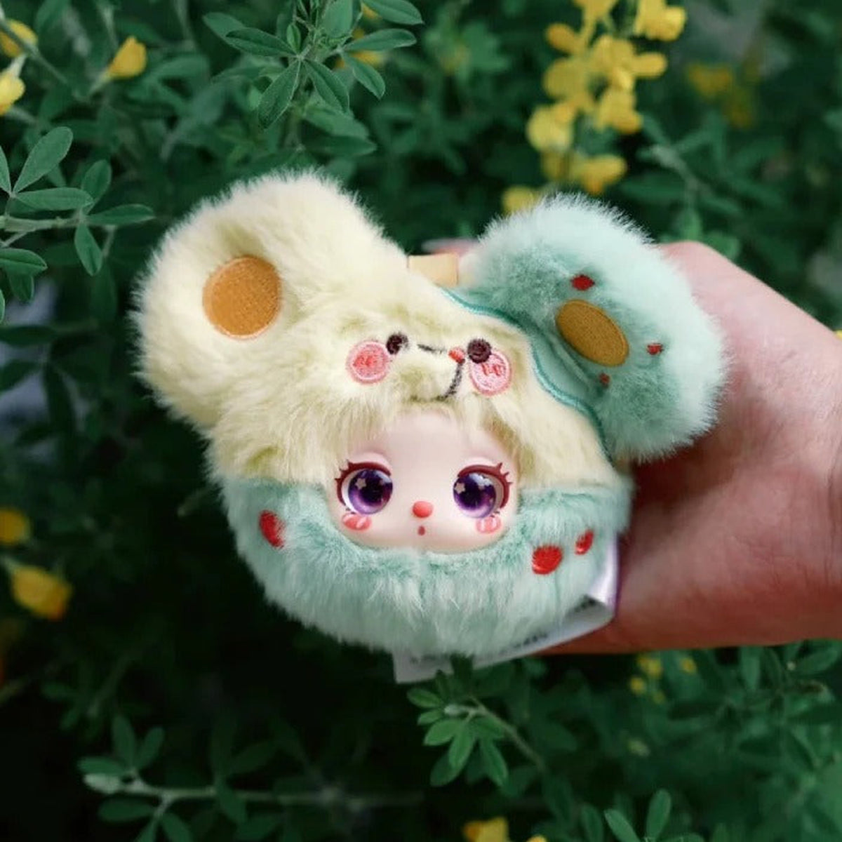 Liila's Garden Tea Party Mini Plush Blind Box — Green mouse-costume Liila MINI plush example shown in a hand
