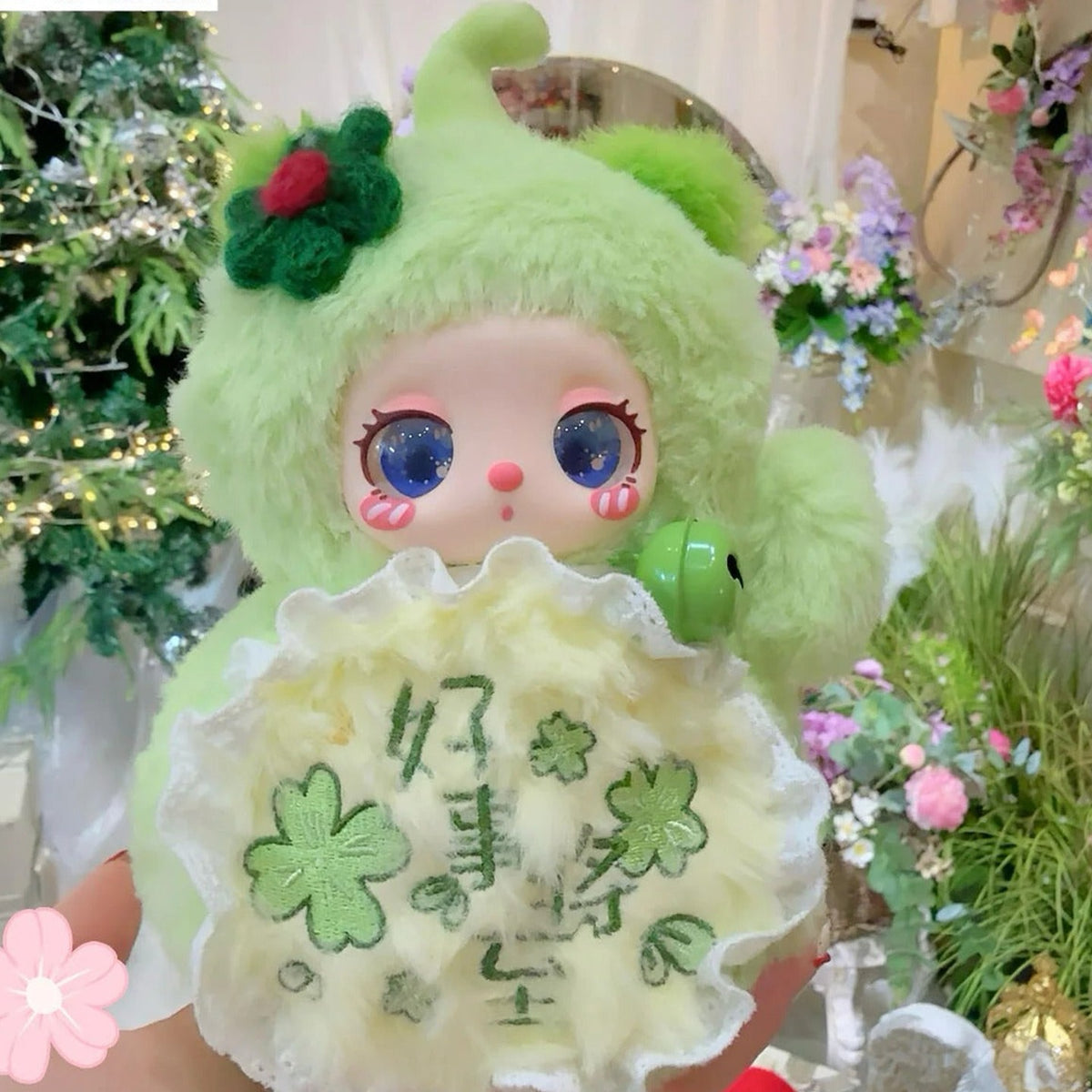 Liila Magic FULU green plush design and flower-front detail; series example