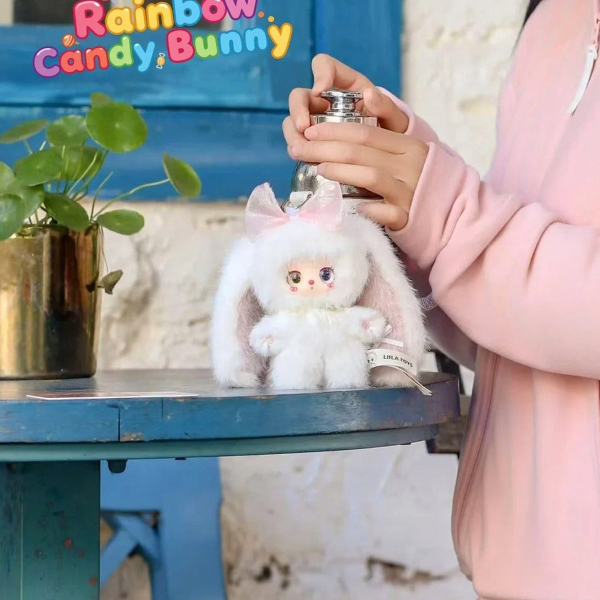White Rainbow Candy Bunny plush in a vanity display scene | KikiBuddies