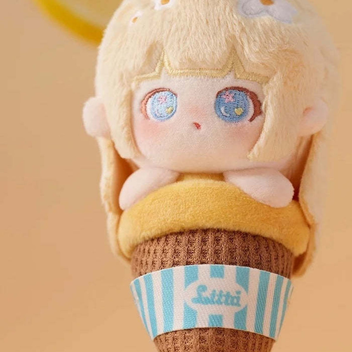 Liita Rainbow Cone yellow plush face and cone costume detail; example design
