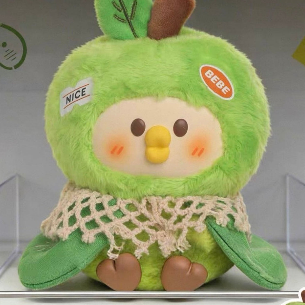 Little Parrot BEBE Foodie Club green apple-costume plush face, knitted collar and feet detail; series example