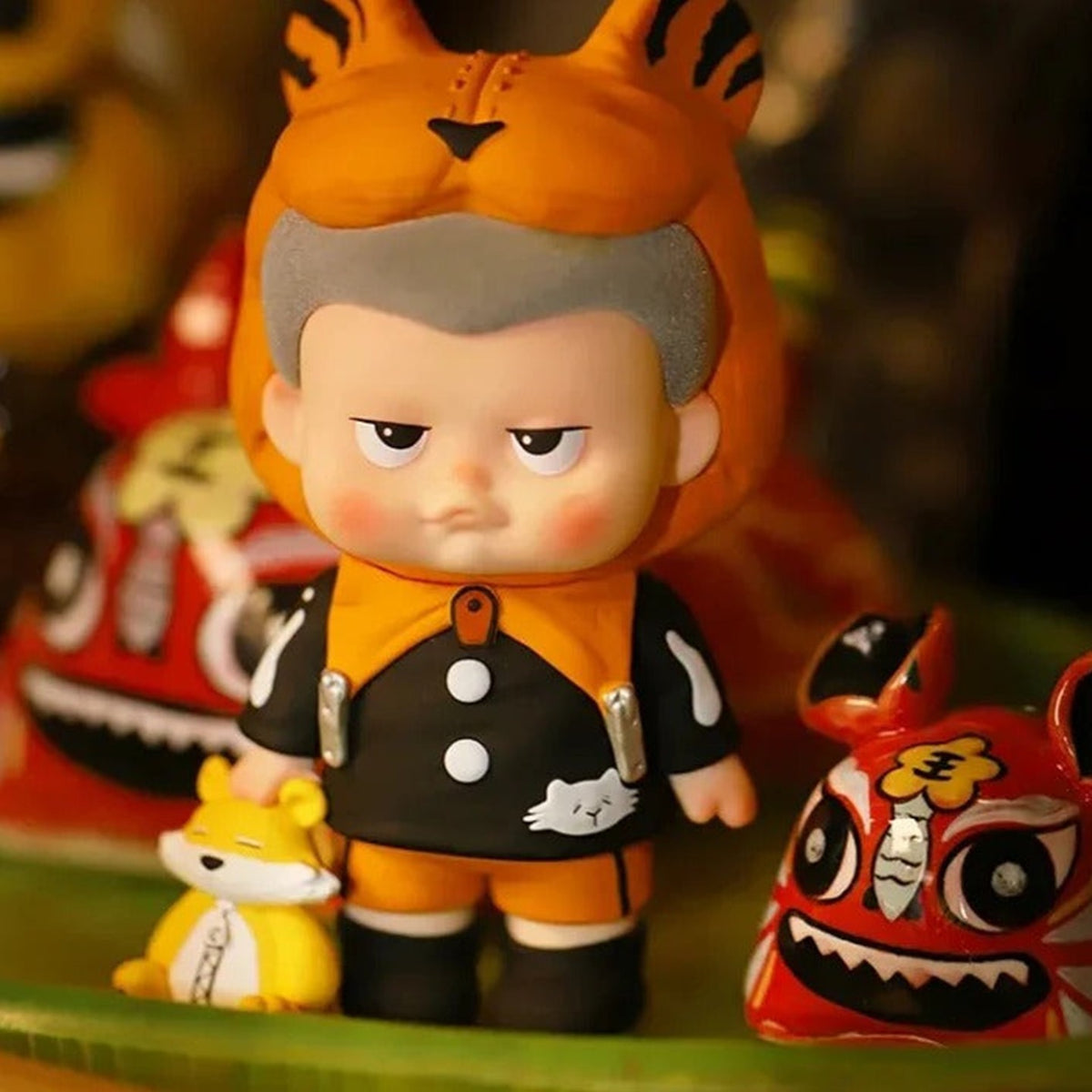 Little Team figure in a tiger costume; series design example | KikiBuddies