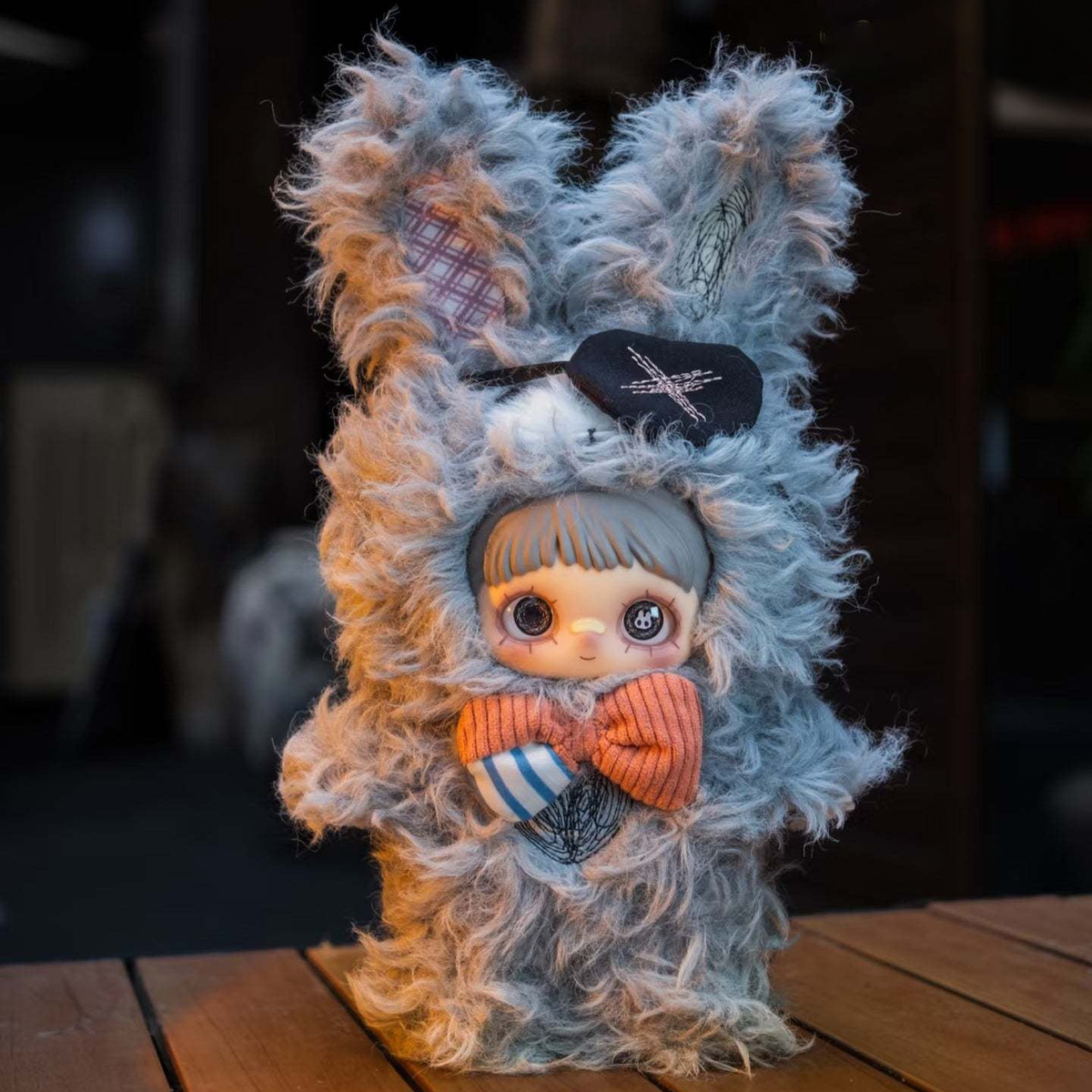 MAYMEI Crazy Ada plush doll in a blue-grey wolf costume with orange bow and heart patch, complete front view