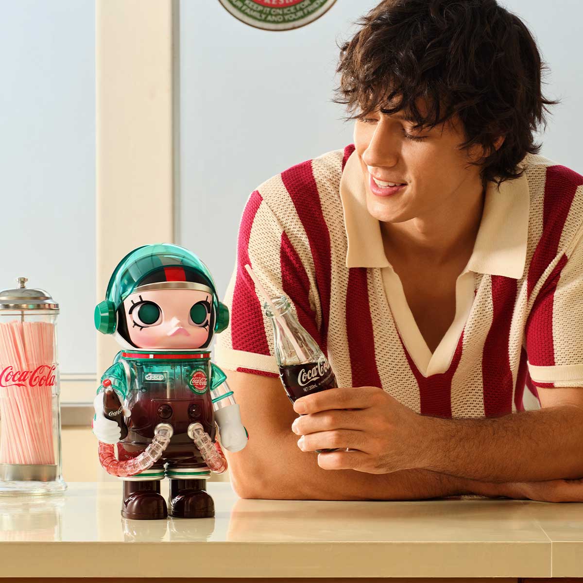 MEGA SPACE MOLLY 400% Iconic Coca-Cola figure shown beside a person for scale; props not included