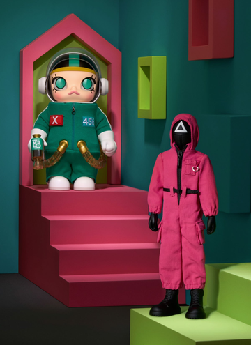 MEGA SPACE MOLLY 400% and Squid Game action figure together in a display scene; pictured designs, not a design guarantee