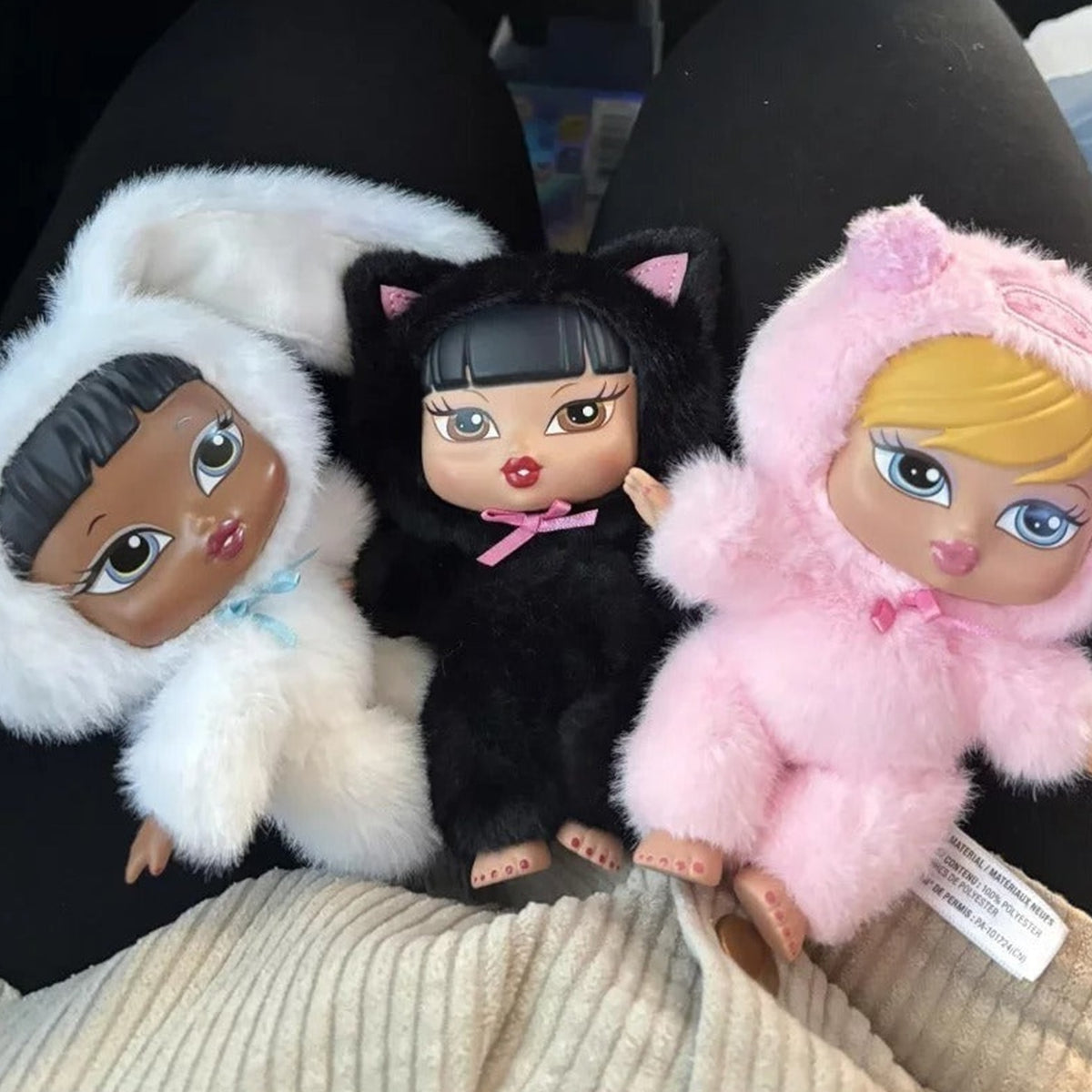 MGA Bratz Bratziez Iconz Series Plush Pendant Blind Box - Plush comparison with complete central black-cat example and cropped outer examples; random design not guaranteed