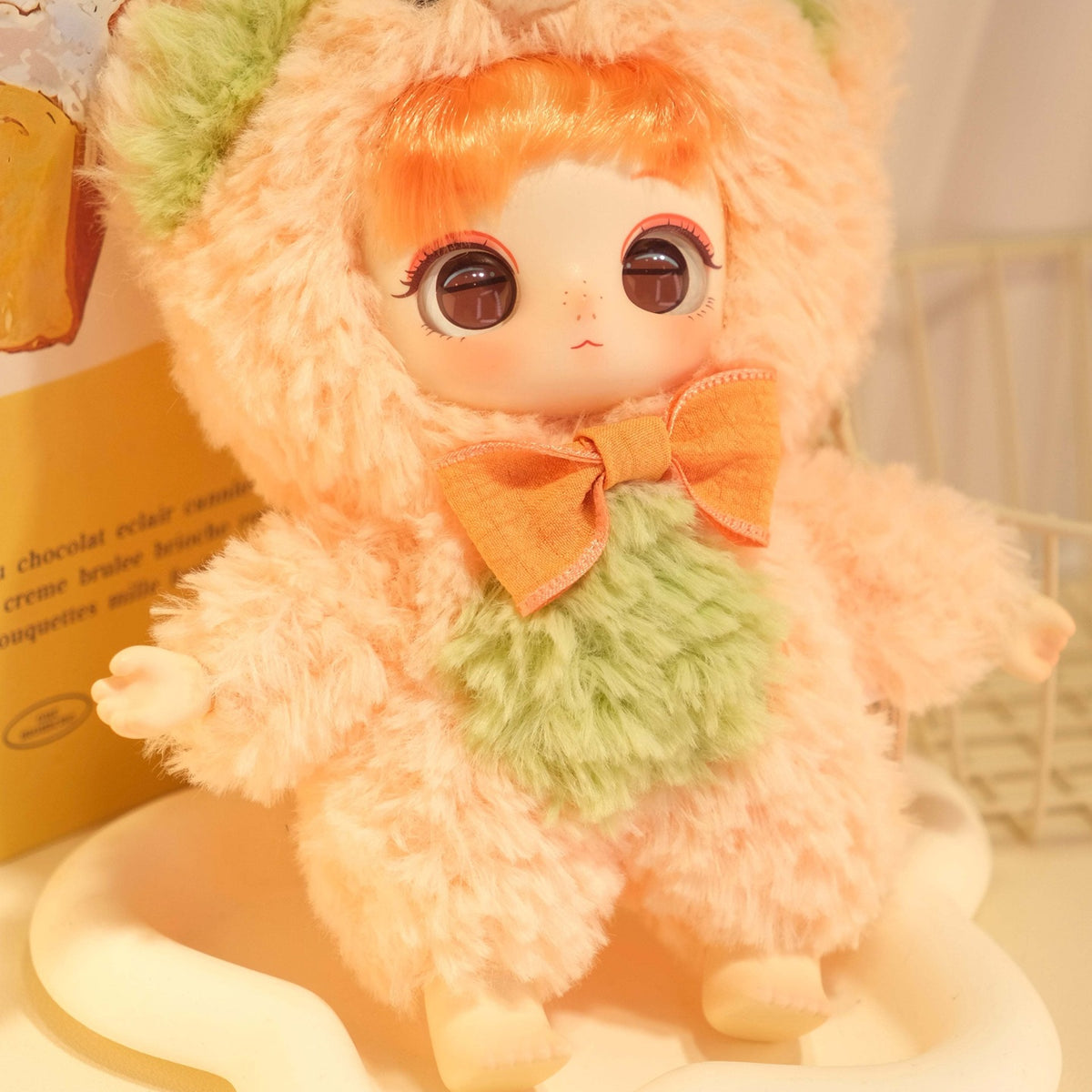 Miaojiuhua (Magic Nine Flower) Series Plush Dolls, Blind Box - Orange plush design with green chest and orange bow; upper hood ears cropped; random design not guaranteed; display props not included