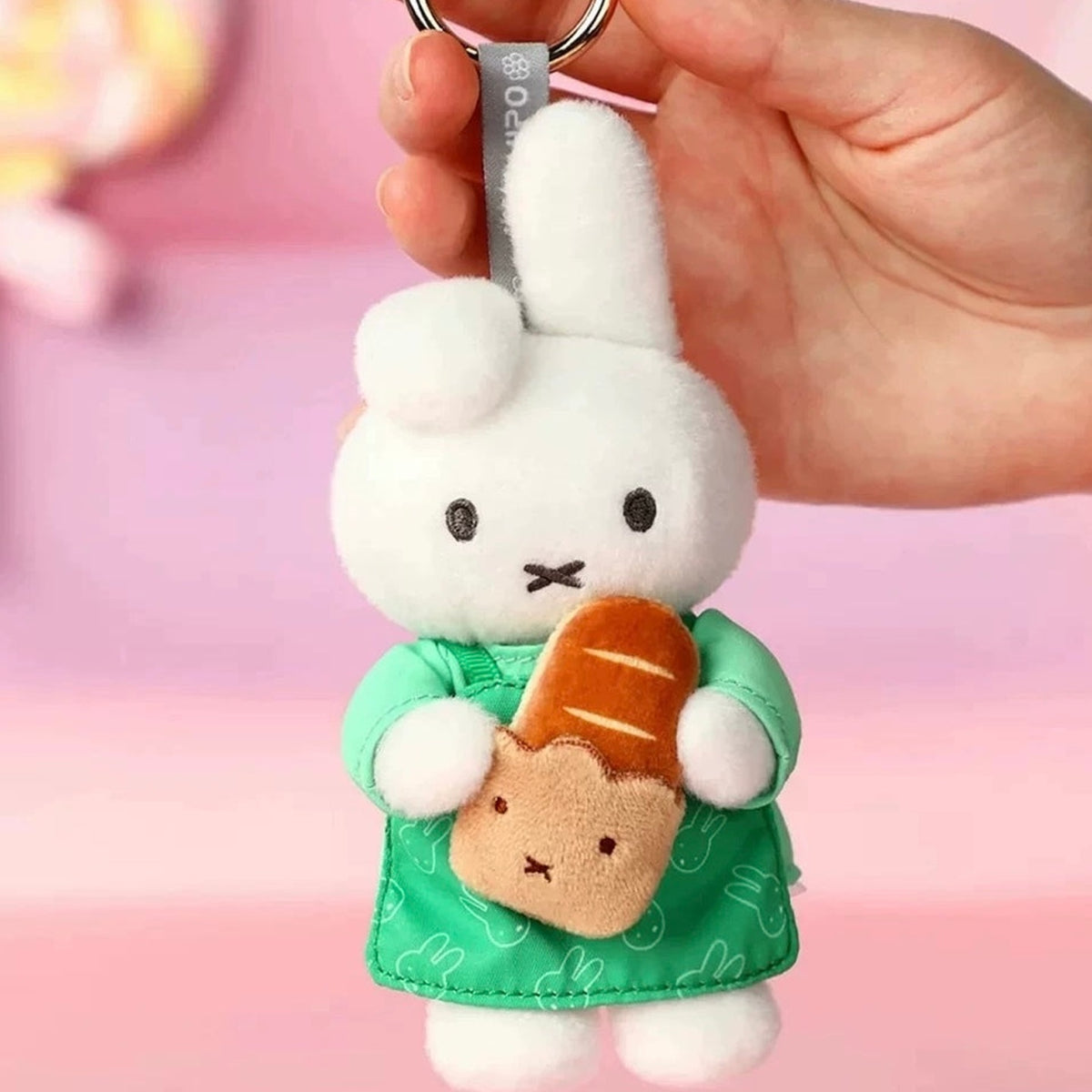 Miffy Bakery Series Plush Pendant Blind Box - Complete green-dressed plush pendant example; random design not guaranteed