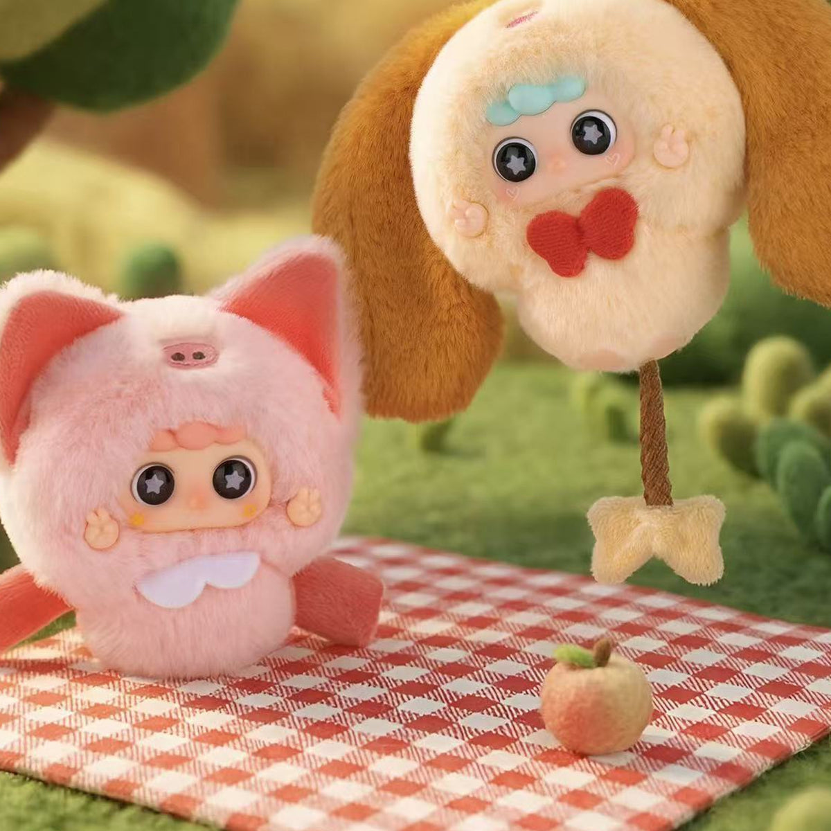 MIGO Little World Series Plush Pendant Blind Box - Pink plush pendant example with adjacent brown example cropped; random design not guaranteed