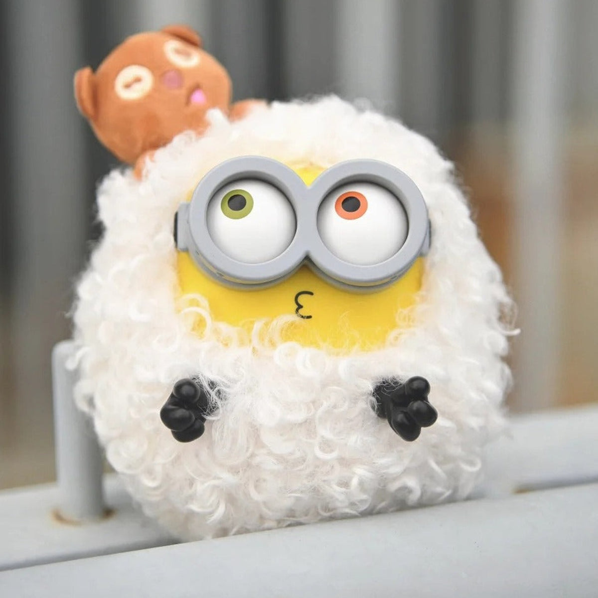 Minions Bob and Tim Best Buddies Forever Series Vinyl Plush Keychain Blind Box - White fluffy vinyl plush keychain detail with lower feet obscured by display ledge; random design not guaranteed