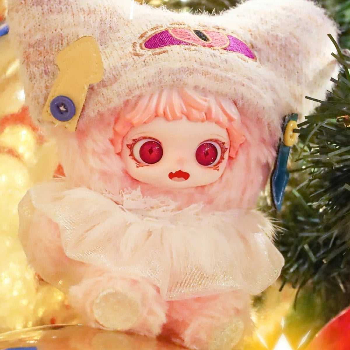 Mioco Realm of Oblivion Series Plush Blind Box - Pale plush doll with colorful hat patches and ruffled collar; upper headwear and lower feet cropped; random design not guaranteed; display props not included