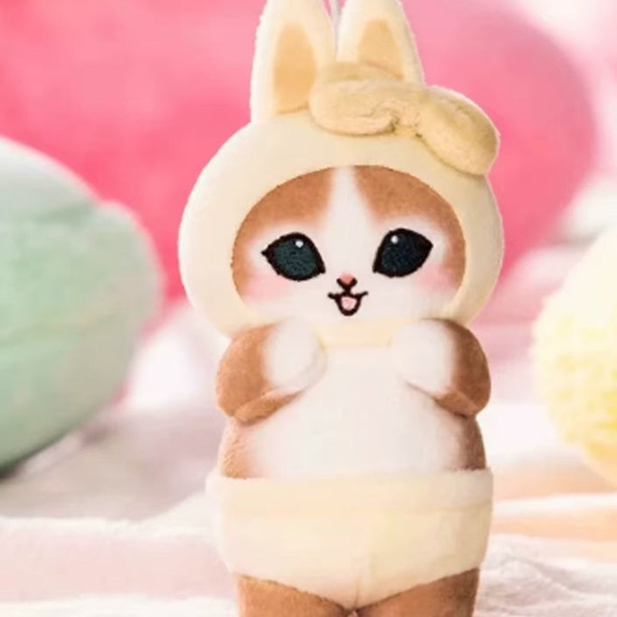 Mofusand yellow rabbit-outfit plush pendant, face and outfit detail
