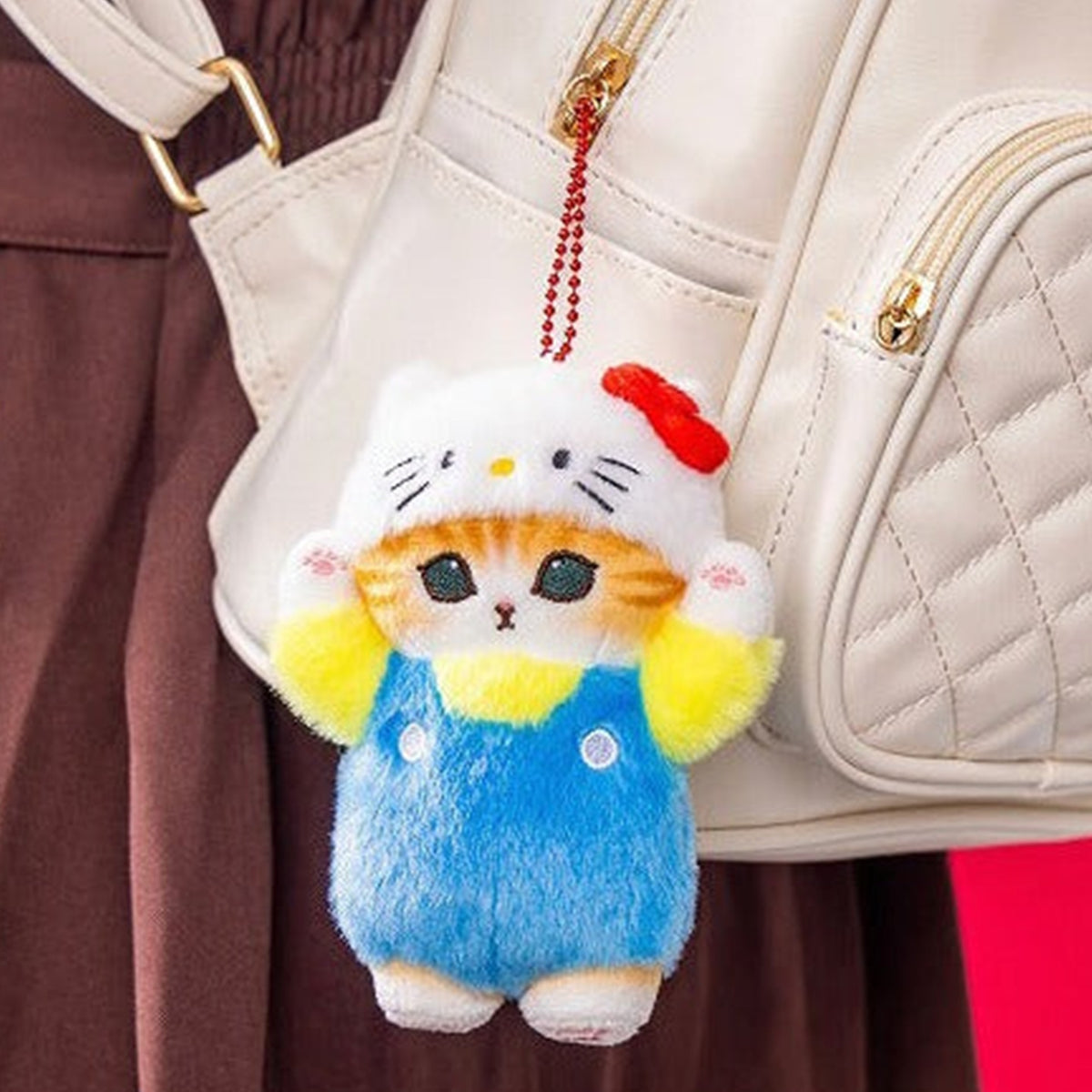 Hello Kitty Mofusand plush pendant attached to a bag; bag not included