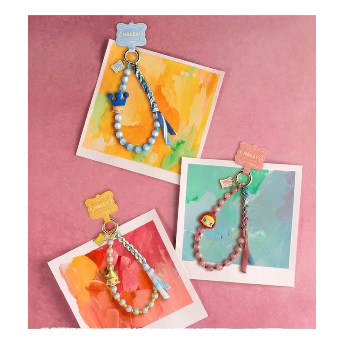 MOLLY Scenery Along the Way 20th Anniversary phone charm, three colored design examples displayed on art cards; blind box contents vary