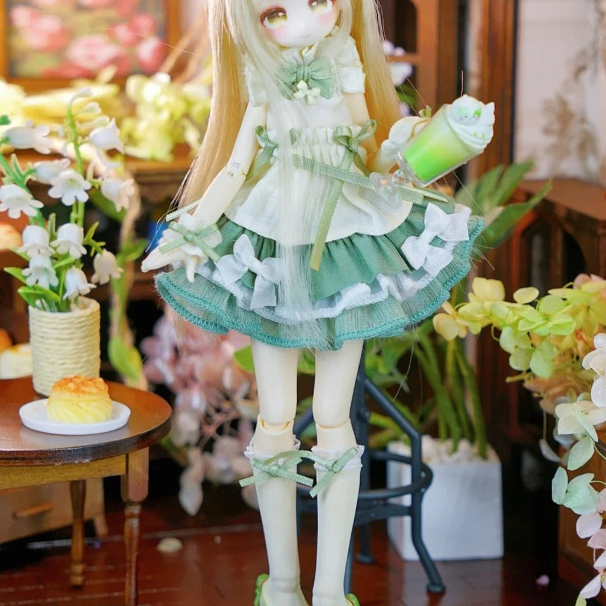 Momotale Four Seasons Tea Tales green tea-inspired skirt, cup and shoe details; series example