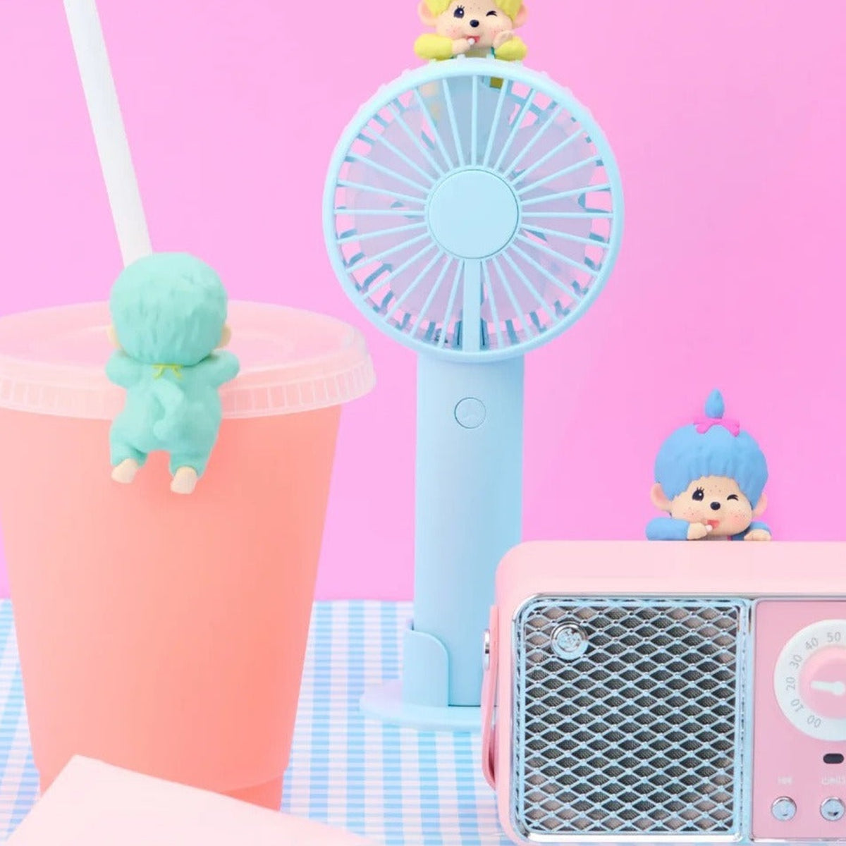 Monchhichi HIPPERS Decorative Mini Figures Colors Wink Series Blind Box - Colors Wink decorative mini figure placement examples; fan, cup and speaker are styling props; random design not guaranteed