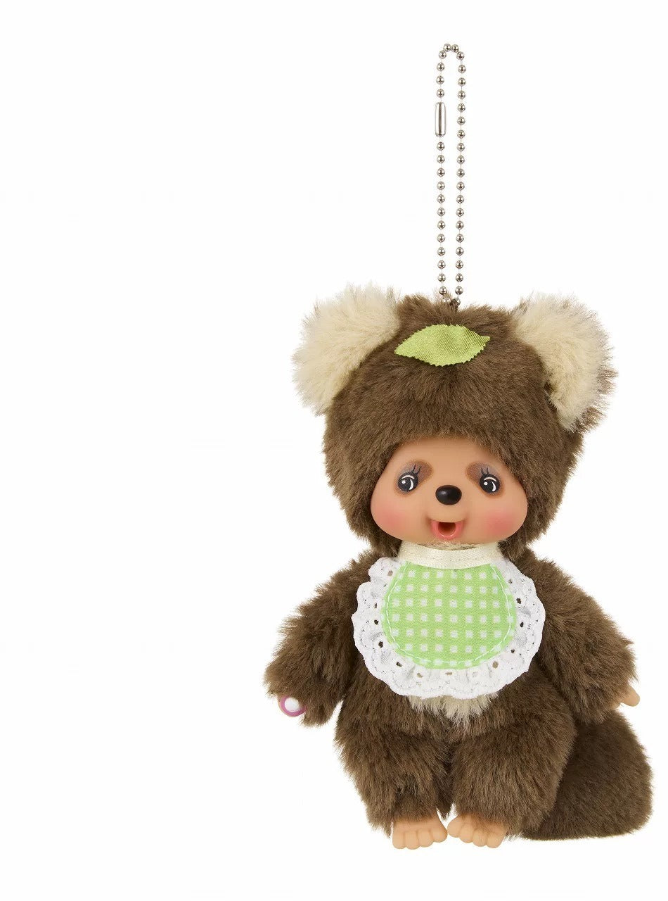 Monchhichi A plush doll in a brown animal costume and green bib, full hanging chain view