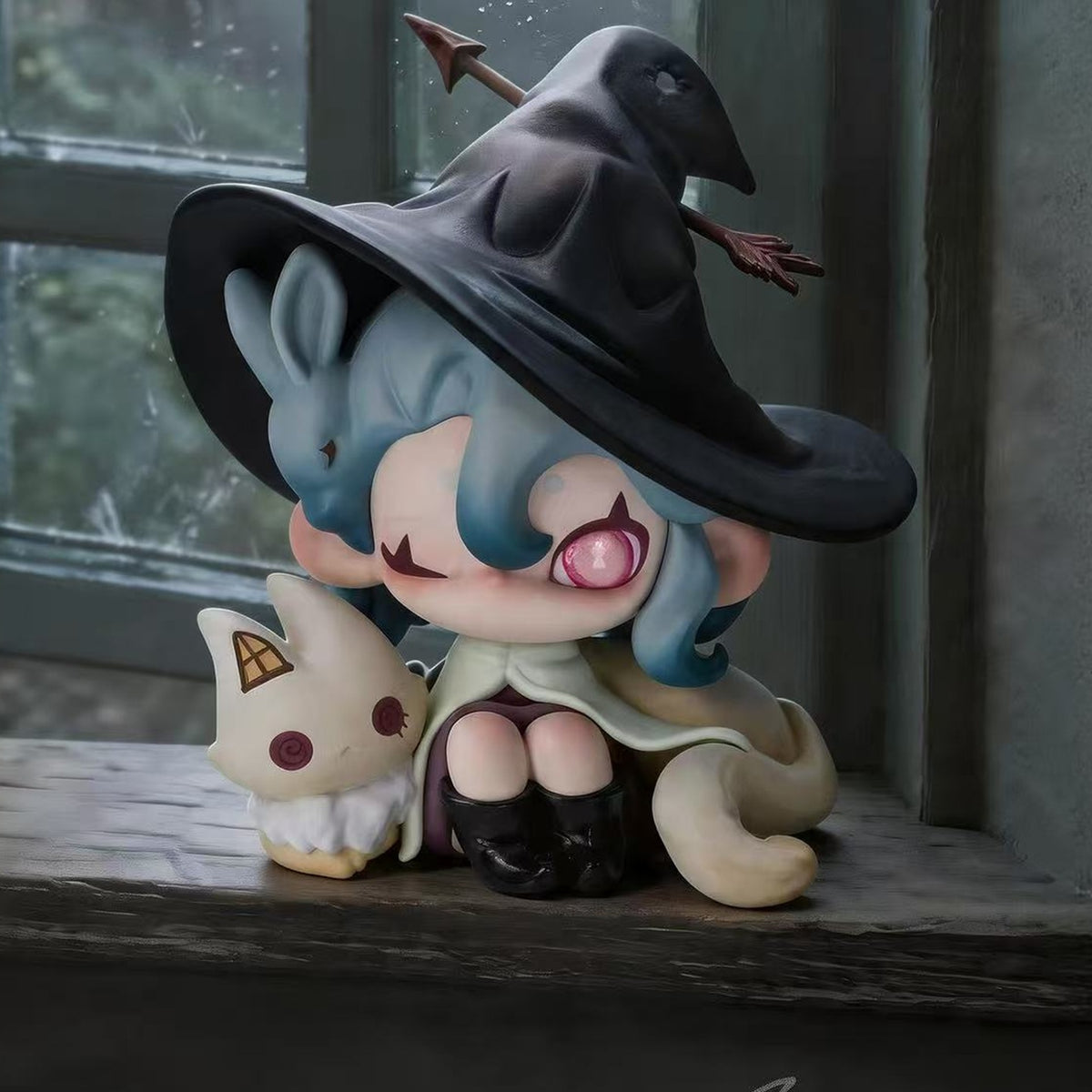 Moonin Fading Childhood Series Figure Blind Box - Moonin witch-costume figure example with upper arrow near image edge; random design not guaranteed