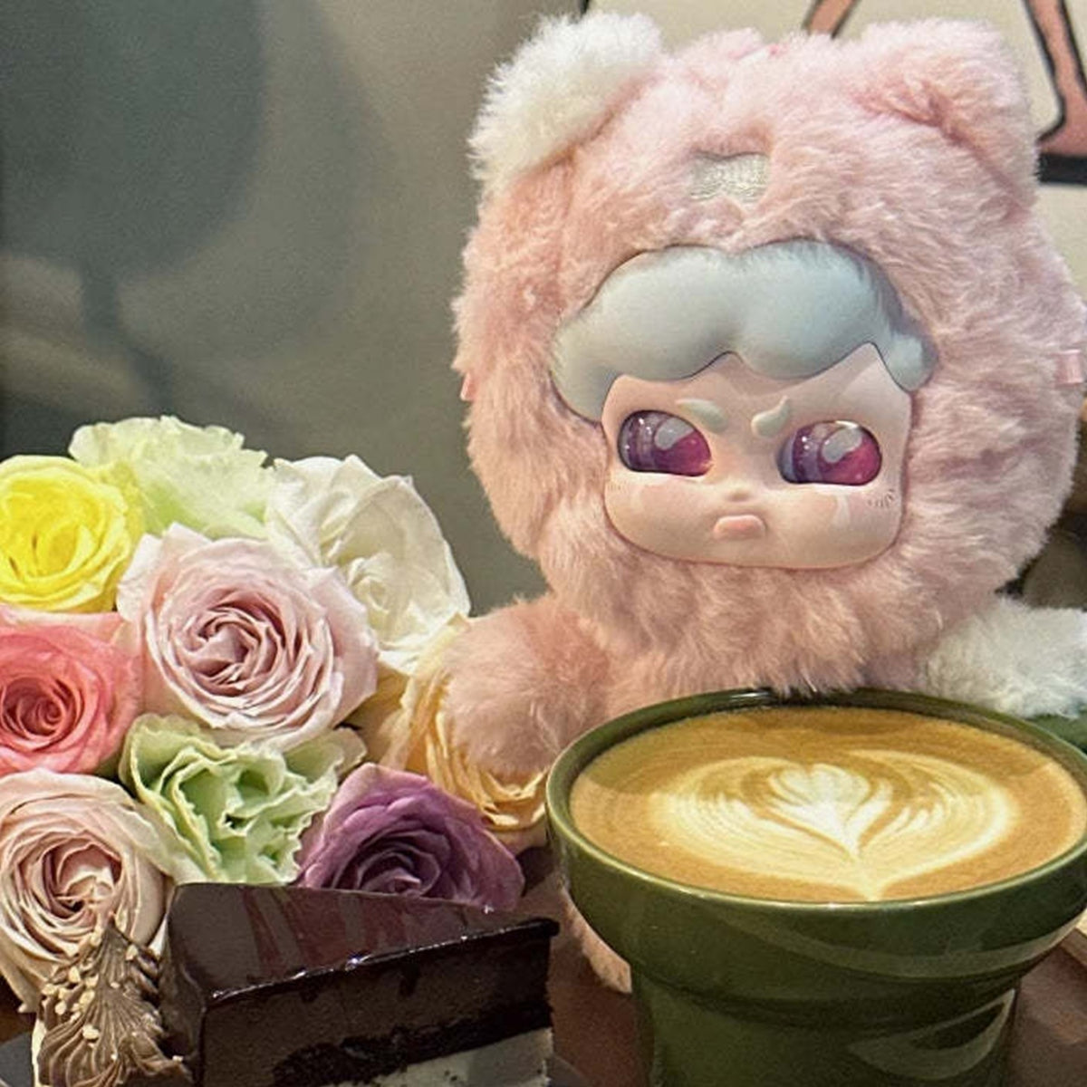 MUMU FOREST WHISPER Series Plush Dolls, Blind Box - Pink MUMU plush hood and face detail beside flowers and a coffee cup; lower body obscured; random design not guaranteed; display props not included