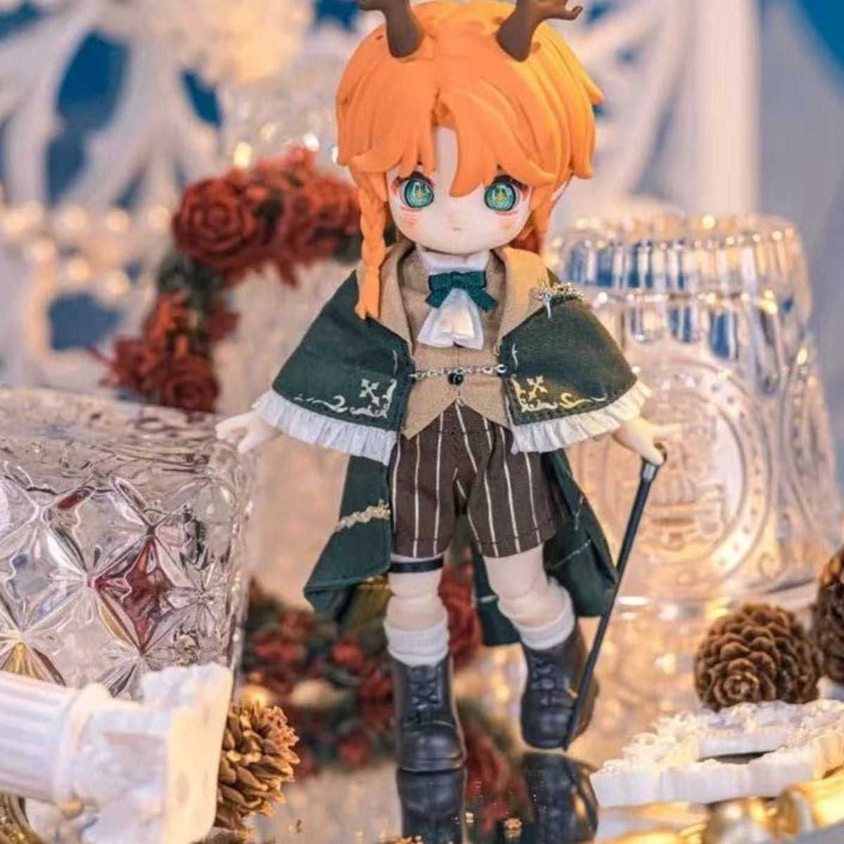 NAGI Illusory Realm orange-haired doll with horns, green cape and striped shorts; series example