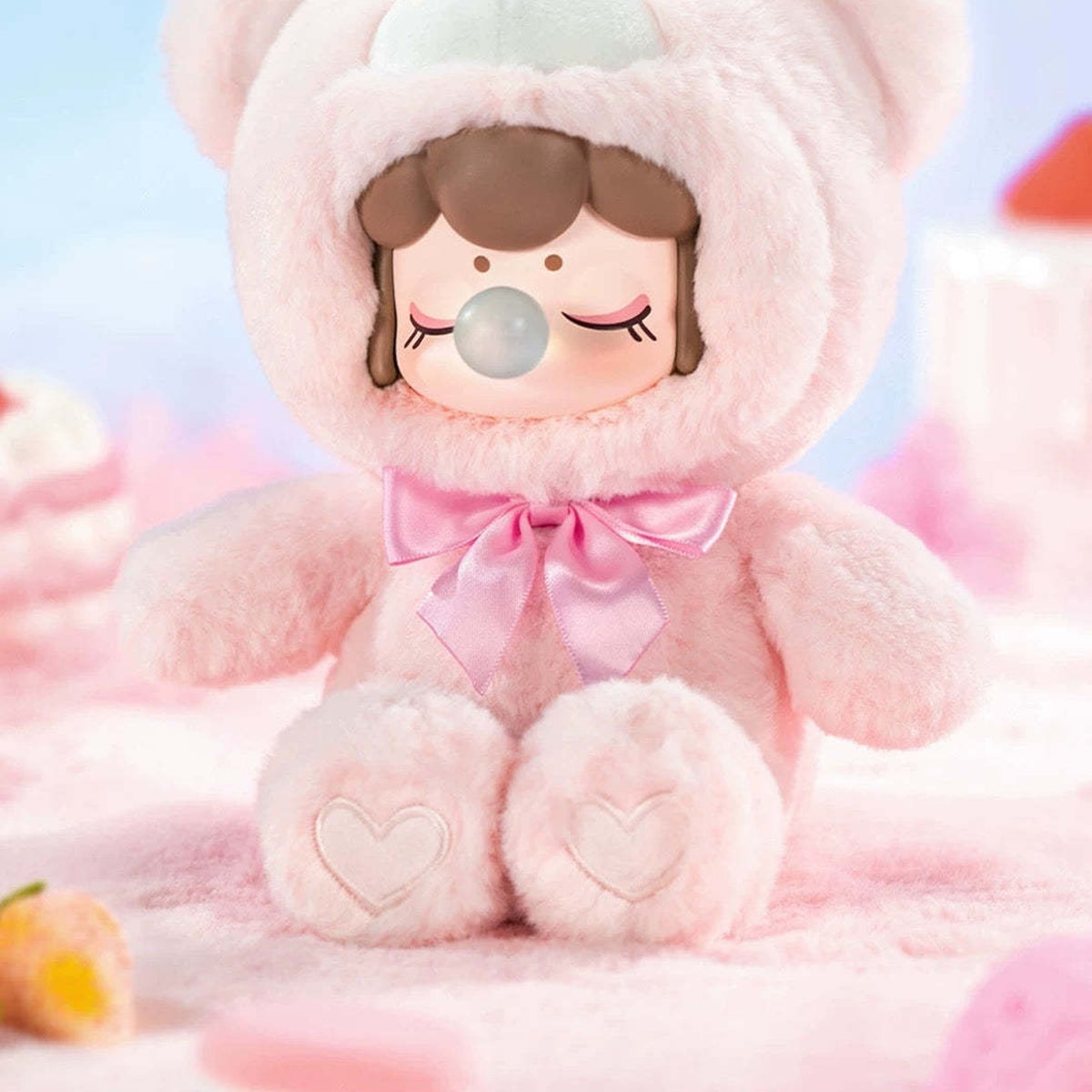 Nanci Colorful Chocolate Cutie Bears: Strawberry Truffle pink bear plush design with a ribbon and heart paw details