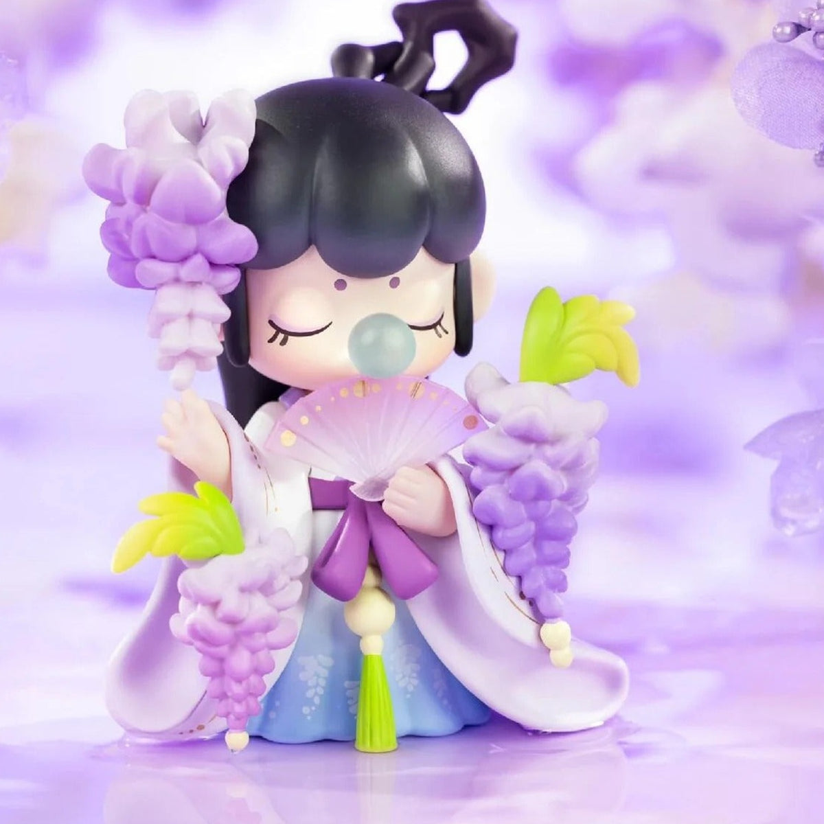 Nanci Flower Stories: Dark-haired Nanci figure with purple blossom styling