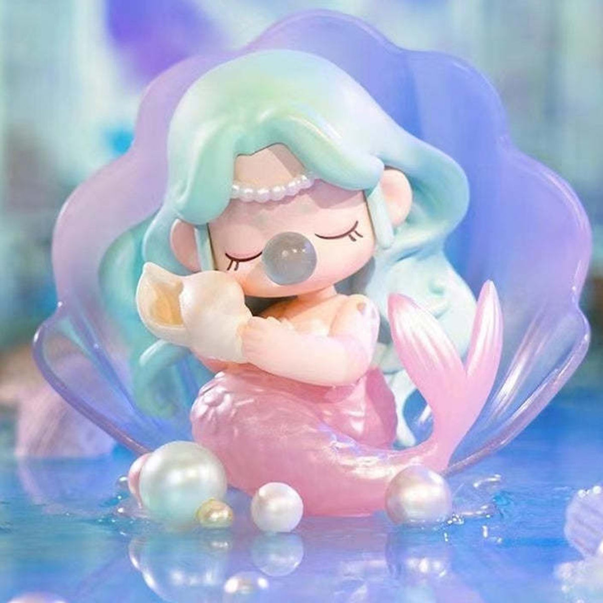 Nanci Museum of Fantasy: Museum of Fantasy mermaid figure with a shell motif; possible design, not guaranteed random contents